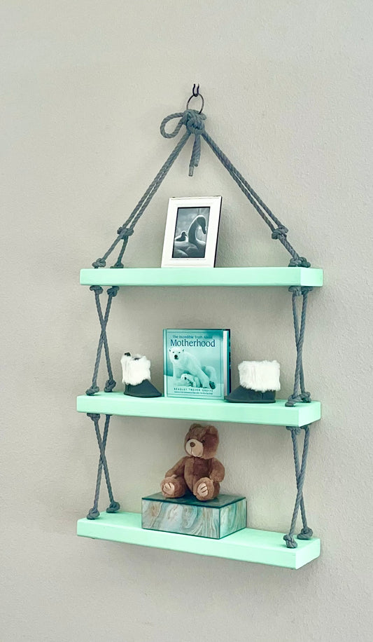 Mint Green Shelves with Criss-crossed Dark Gray Rope